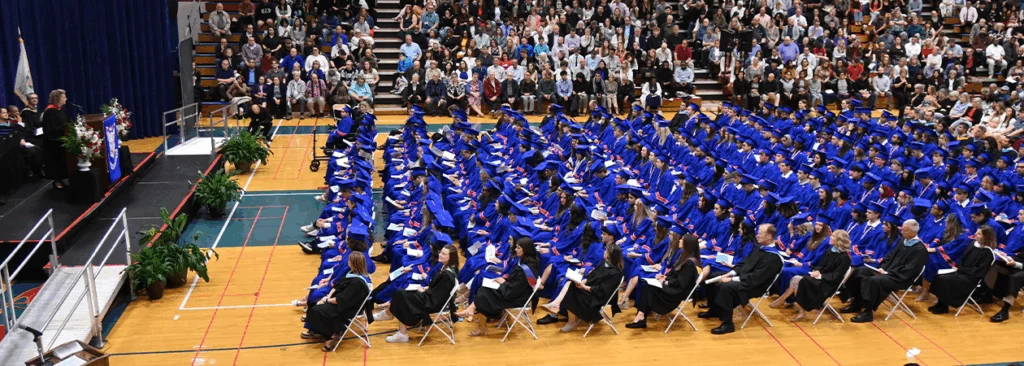 Commencement 2025 photo of graduates in gym