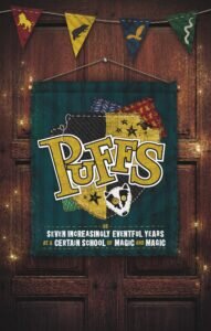 An image of a door with a banner with the play title: "Puffs, or Seven Increasingly Eventful Years at a Certain School for Magic and Magic"